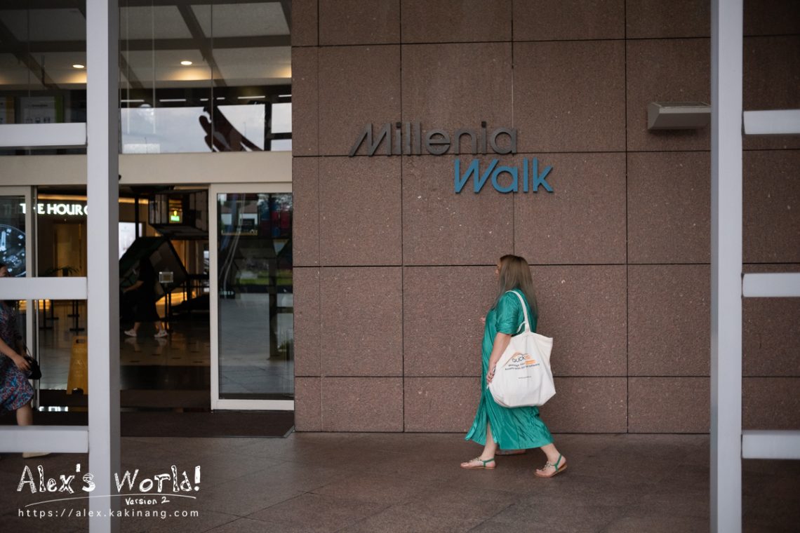 Lady walking into Millenia Walk, Singapore. May 2023